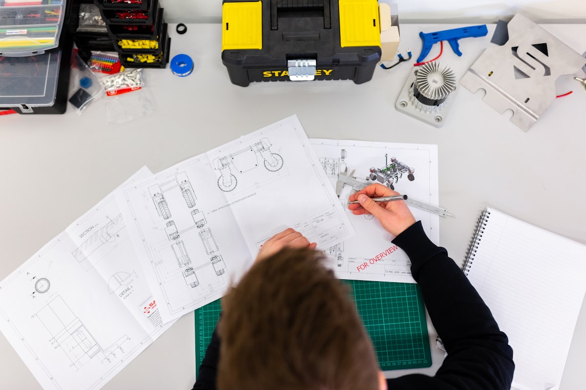 DANIMAK engineer reviewing mechanical and electrical drawings
